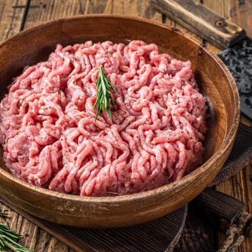 Chicken,Or,Turkey,Mince,Meat,,Raw,Poultry,In,A,Wooden